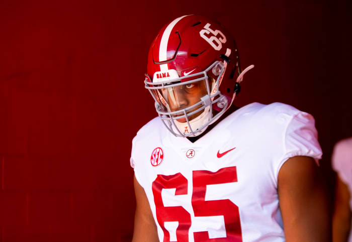 Alabama Crimson Tide defensive lineman JC Latham (65) against the Florida Gators